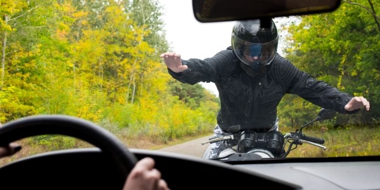 motorcycle rider in Columbus about to have an accident